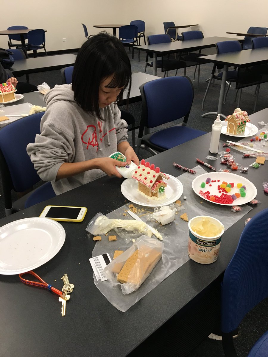 UTMInternation's tweet photo. Making gingerbread houses!!  What a sweet day to be a sky hawk.  #utmartin https://t.co/6a94akzcpH