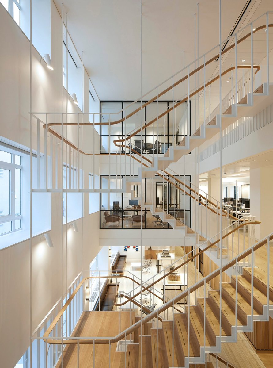 RIBA Chartered Practice <a href="/PiercyCo/">Piercy&Company</a> suspends staircase in new atrium of Savile Row office via <a href="/Dezeen/">Dezeen</a> bit.ly/2BMGaQN #architecture