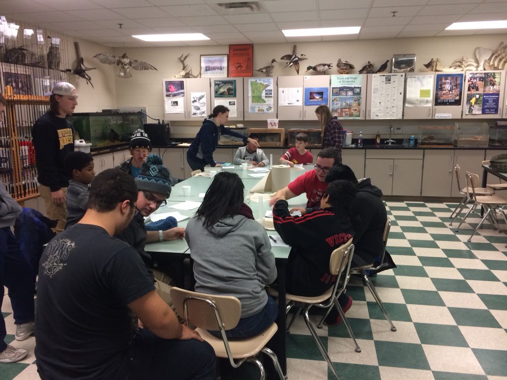 Learning about trout with our high school friends!