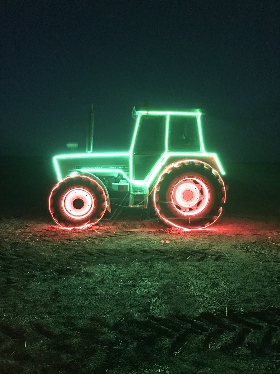LFelmingham's tweet photo. Pretty happy with my first attempt at lighting up a tractor and not needing the fire service. Old man wasn’t too unhappy that his first tractor isn’t in the shed. #fendt #farmXmas https://t.co/bUm4uFRulk