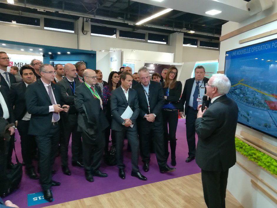 CASAOfficiel's tweet photo. >>#SIMI2017 : Jean LEONETTI, Président de la CASA et du SYMISA, présente et lance officiellement l’opération d’aménagement "Les Trois Moulins" à Sophia. Ce programme constituera la porte d’entrée et la vitrine architecturale contemporaine de la technopole de #SophiaAntipolis https://t.co/n6HjsZNFe1