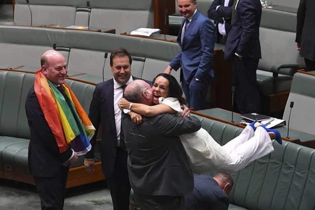 Opposing parliamentarians Warren Entsch and Linda Burney celebrate the passing of legislation to legalise same sex marriage in Australia. Today was a good day.