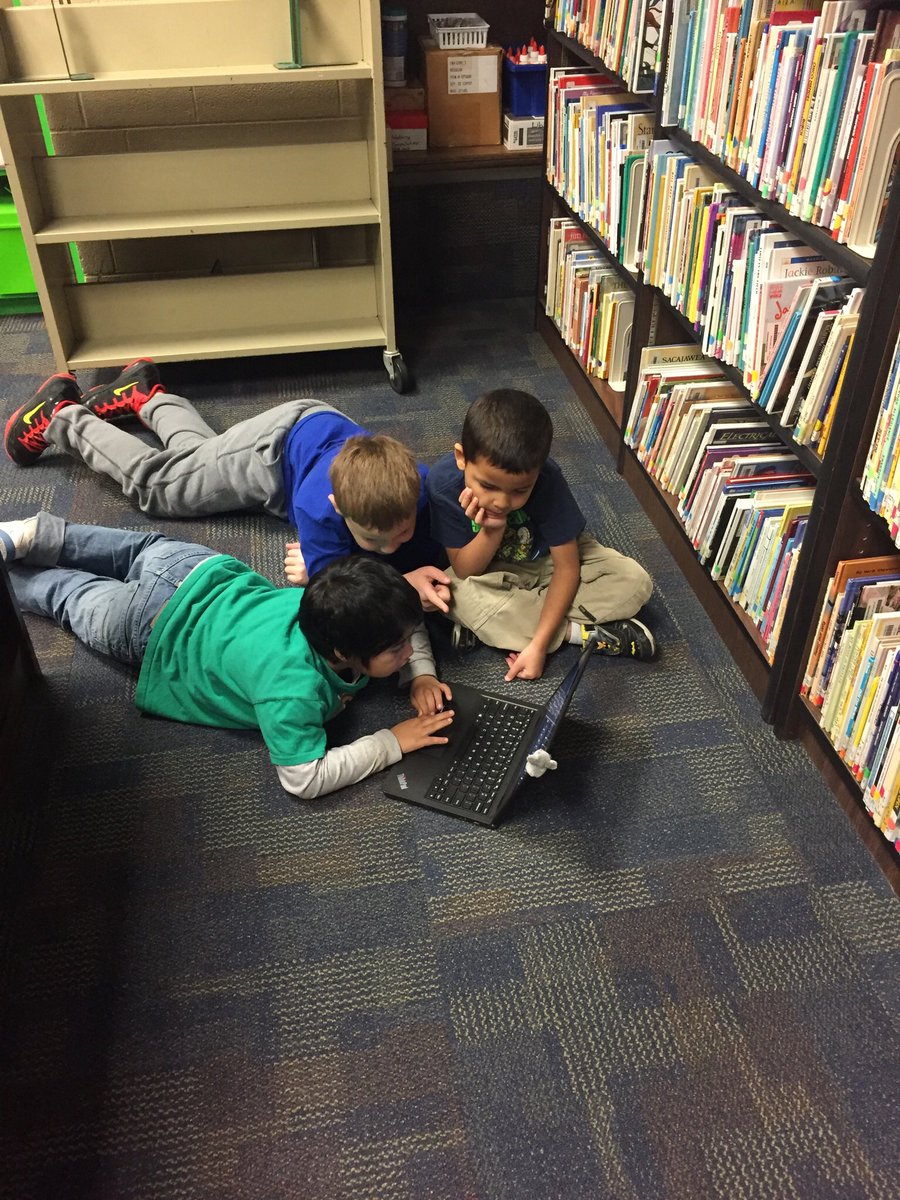 1st and 4th graders code so well together! #hourofcode #computerscience
