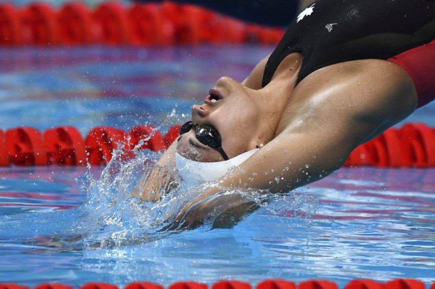 WBR_London's tweet photo. Kylie Masse sets the 100m backstroke world record in 58.10. Masse powered to the wall in a time of 58.10 seconds, edging the previous long-course backstroke record of 58.12 seconds set by British swimmer Gemma Spofforth at the 2009 world championships in Rome. https://t.co/KRHT92vLYr