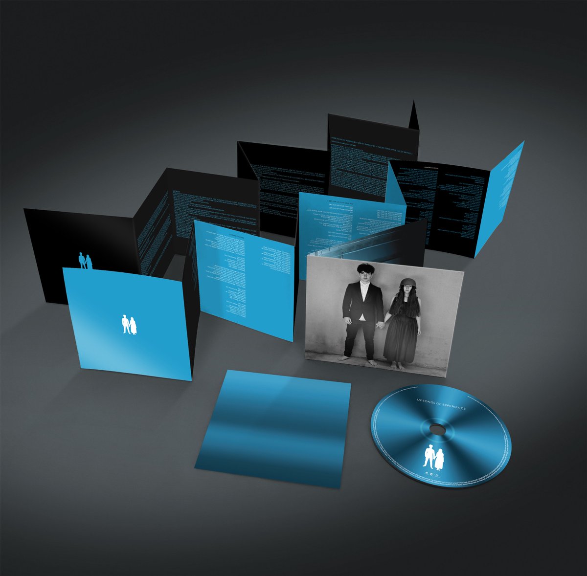U2's tweet photo. 'This is no time not to be alive…’  Seen the deluxe Vinyl &amp; CD formats of Songs of Experience? They’re beautiful in blue. 
#U2SongsofExperience #U2 https://t.co/XhGU0nJ5zL https://t.co/IHS0KO76CU