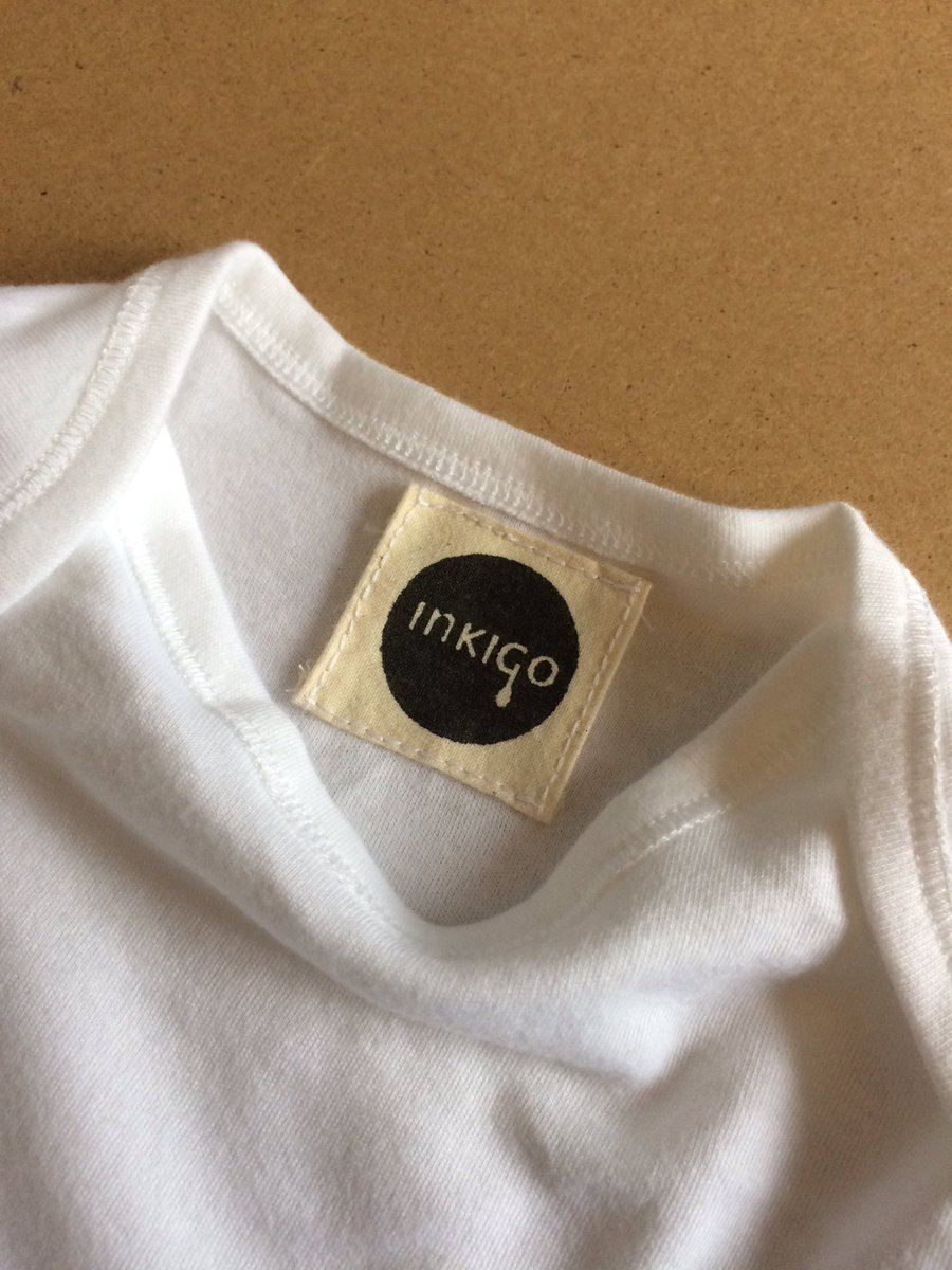 _Inkigo's tweet image. All clothing garments will now come with my screen printed logo sewn inside #screenprinter #freelance #clothing #babygrow #logo #inkigo