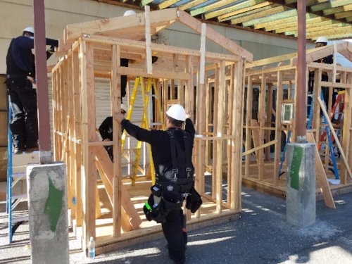 JobTrain's tweet image. The saws are singing and the hammers are harmonizing as our #ProjectBuild #Construction students work on their latest project! This 8x10 structure is great #HandsOnExperience that includes shingling the roof and installing insulation + drywall. Great work, team! #JobTrain