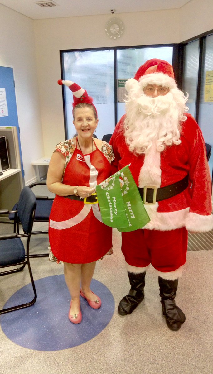 eugenehwhite's tweet photo. For sixth year, Solicitor by day, Santa by night; with Elf Patricia McArthur for Nundah Now Inc community Christmas function. Growing older but the children never seem to. https://t.co/2GLpBXAwWa