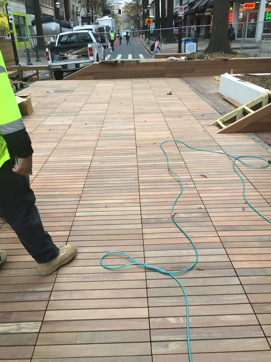 ATLCityStudio's tweet photo. Exciting day rolling out the decking on Broad Street! Proof that the right hand and left hand @ATLPlanning @ATLPublicWorks can work together. Check it out, opening soon! #designATL https://t.co/d3dUv4fhHa