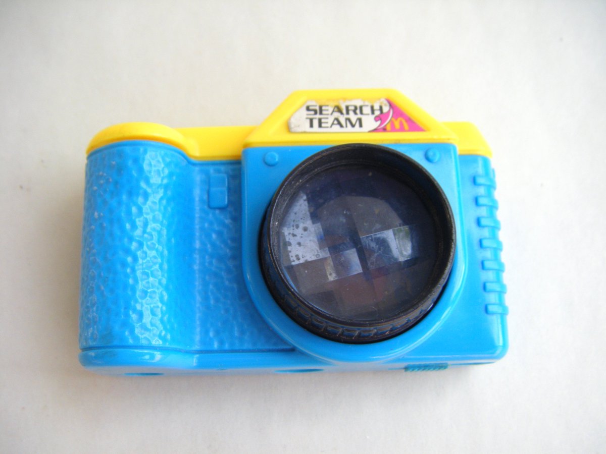 BusterJustis's tweet image. Super cute vintage mini camera. From 1992 McDonalds Happy Meals! This is such a great toy! It has a prismatic lens for a kaleidoscope effect. Find it here: etsy.me/2eOhQTX #etsy #collectible #cameratoy #vintagetoy #photographer #desktoy #cubiclebuddy #ReduceReuseReLove