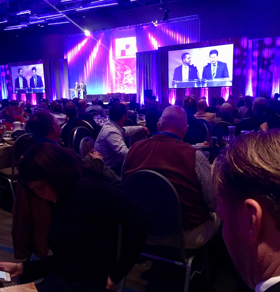 OhioFarmBureau's tweet photo. President Frank Burkett &amp; Executive Vice President Adam Sharp announce the County Achievement Award winners at the 99th Annual Meeting’s Harvest Banquet. 
#OFBF17 https://t.co/OvoONgQbH5