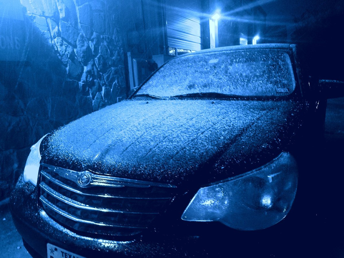 GroovyAutoATX's tweet photo. Snow in Austin tonight at Groovy Automotive!  Drive safe.  If your battery is dead tomorrow morning we can help.  512-492-8050 https://t.co/yGUa6lhNv5