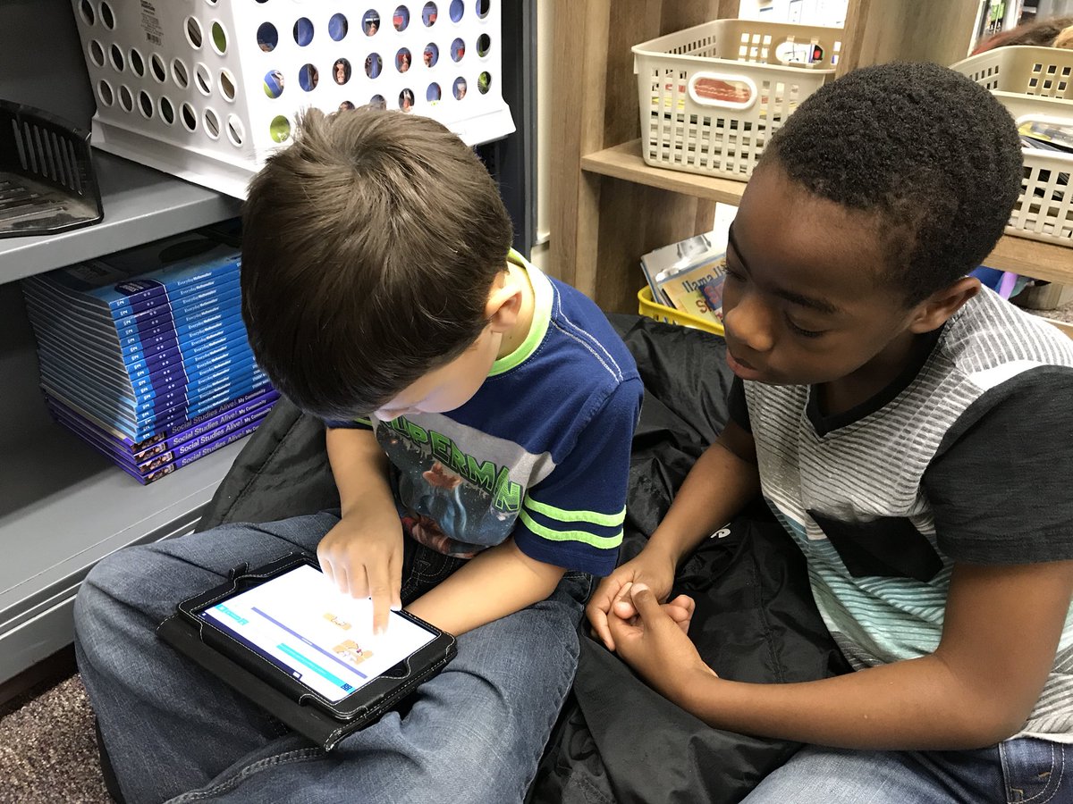 LABridgeford3's tweet photo. 3rd graders had fun teaching their 2nd grade buddies @MrsBHoff how to code! #HourOfCode https://t.co/dPAmZ19Onf