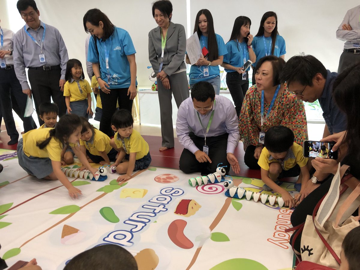 hourofcodesg's tweet photo. Minister attempting to code the codeapillar with guidance from the children 😄 https://t.co/b2duBePzto