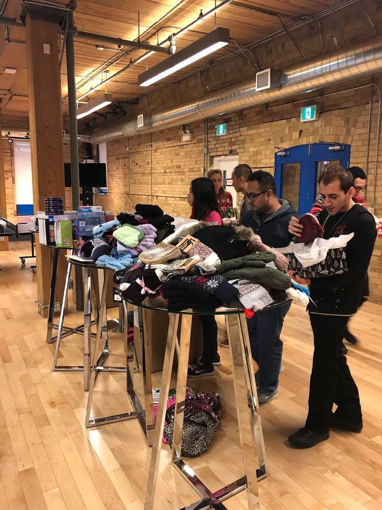 q4tweets's tweet photo. In support of @shoeboxcanada, the #Q4orce came together to build more than gift boxes - but smiles! Cheers for the generosity, time and thought put into each box. π βοΈβ¨ππΌ It definitely put a smile on our faces, as we hope it does to others. #kindnessiscanadian #toronto https://t.co/QWoClx9NXY