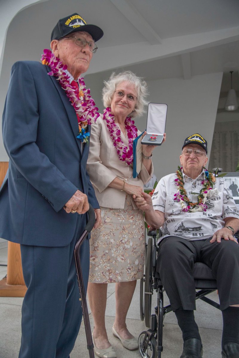 At last...Joe George has been officially recognized for his valor on 12/7/1941 when he disobeyed orders to save the lives of six Arizona crewmen, including Donald Stratton and Lauren Bruner. At center is Joe's daughter Joe Ann, who was presented the Bronze Star for her father.