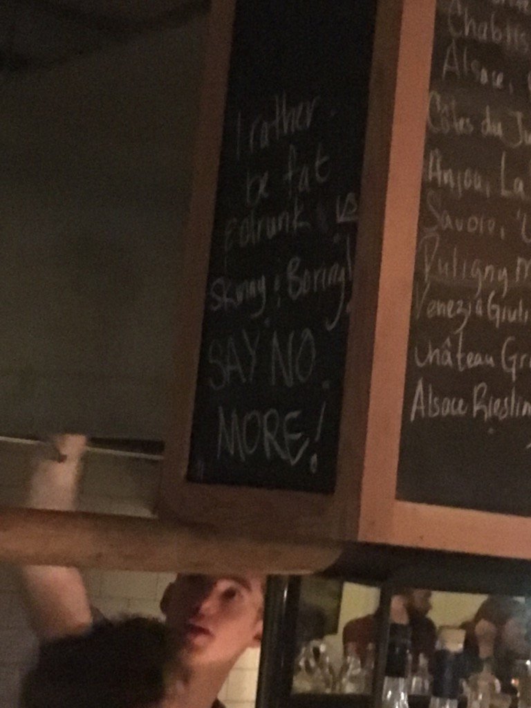 Dave_McGinn's tweet photo. On the chalkboard behind the bar at Joe Beef in Montreal. #weekendmotto https://t.co/Enr37OZIx2