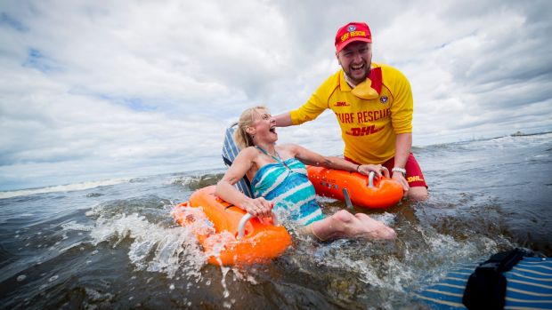 'It feels amazing': Amanda takes her first sea dip in 11 years thanks to St Kilda's new floating wheelchairs. ow.ly/nTco30h7b0C