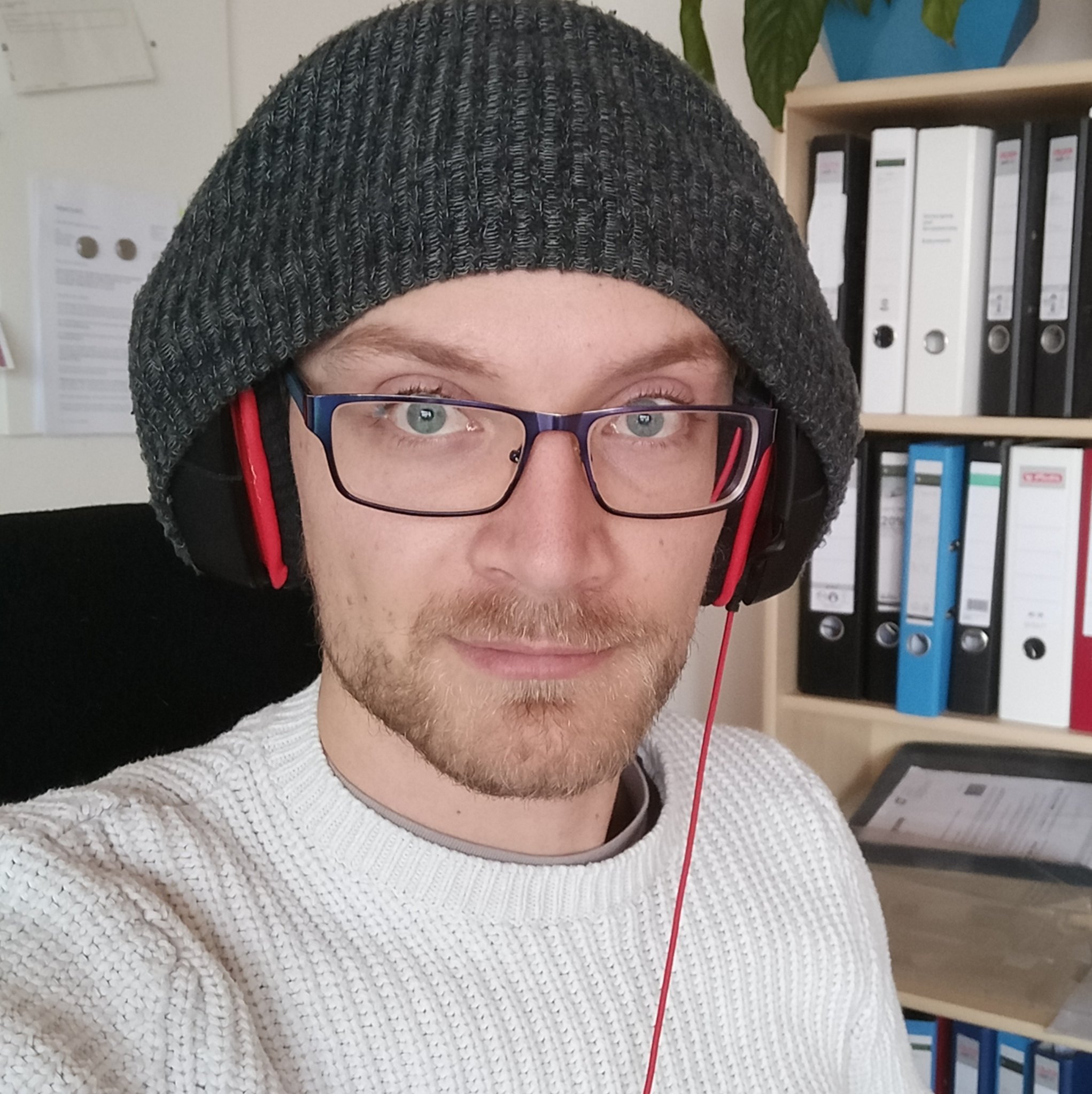 Thomas Sanladerer on Twitter: "Beanie + Headphones: Over or under? Twitter