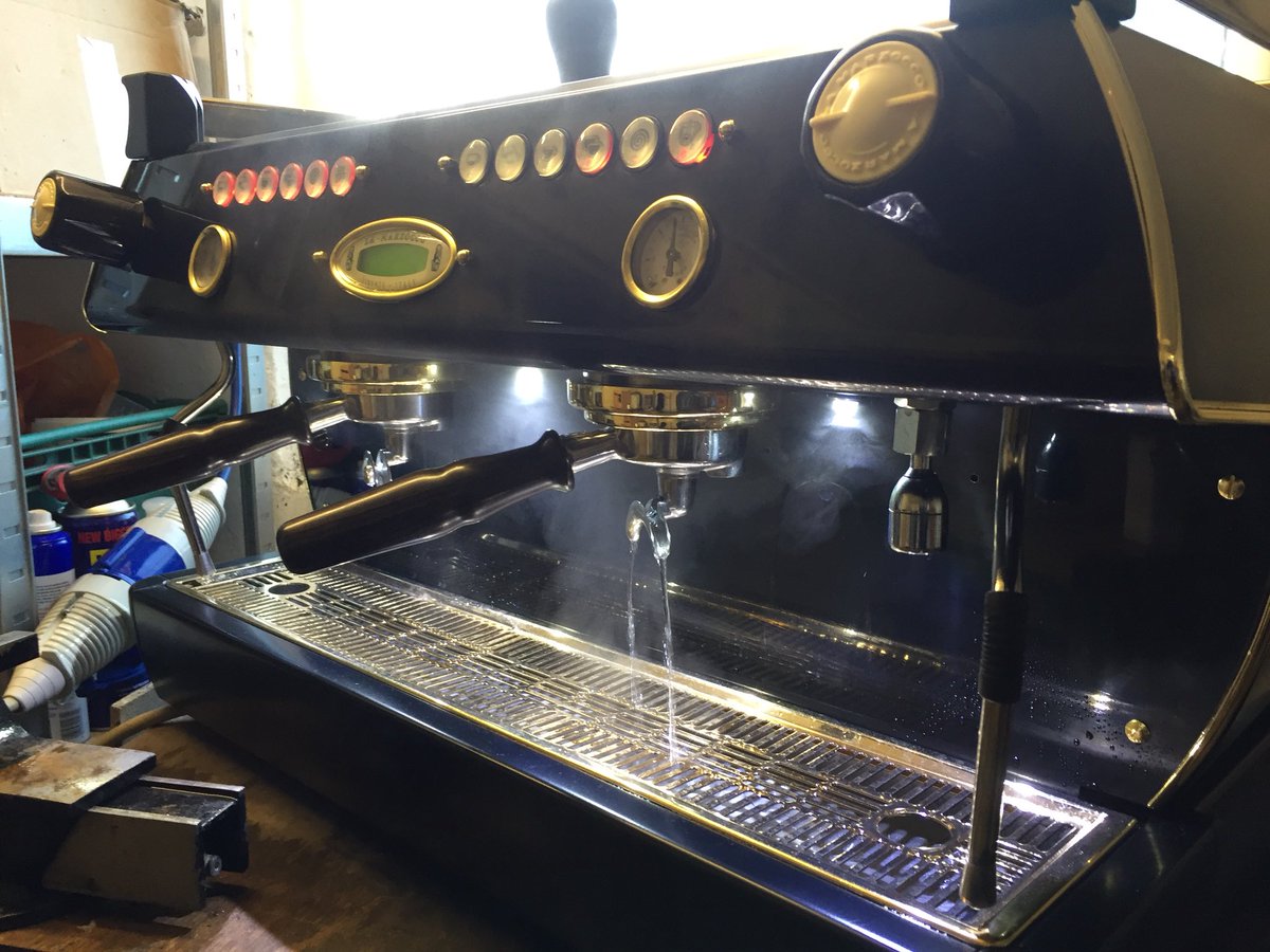 ModEspresso's tweet photo. The business end gold plated details, black zinc plating, African black wood handles barista lights. https://t.co/JGbYb3grNJ