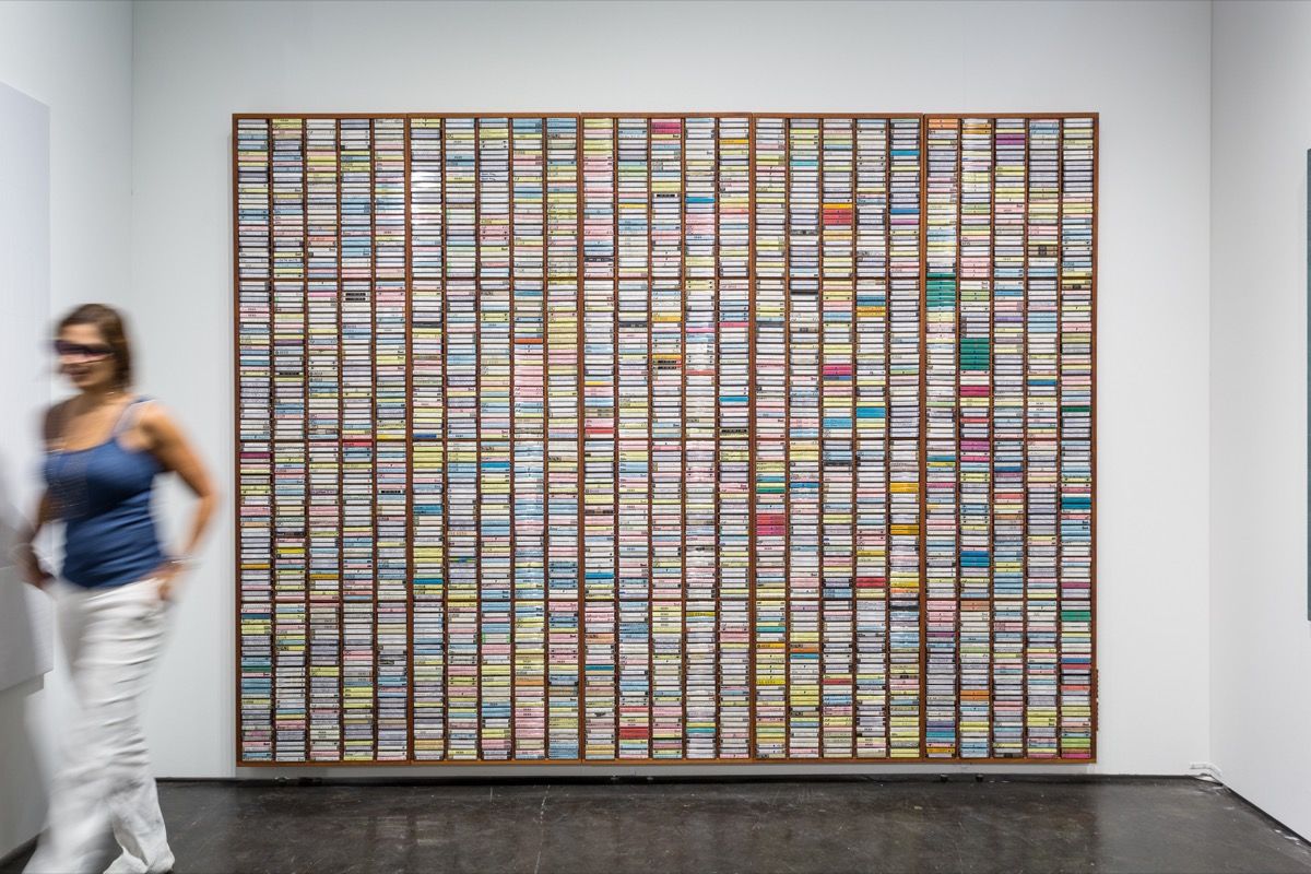 Mark A. Rodriguez; 2,800 Grateful Dead cassettes; 2017. At Park View/Paul Soto Gallery. #NADA (From <a href="/artsy/">Artsy</a> @ ScottIndrisek ) An iron cross hanging down from around the neck of several generations.