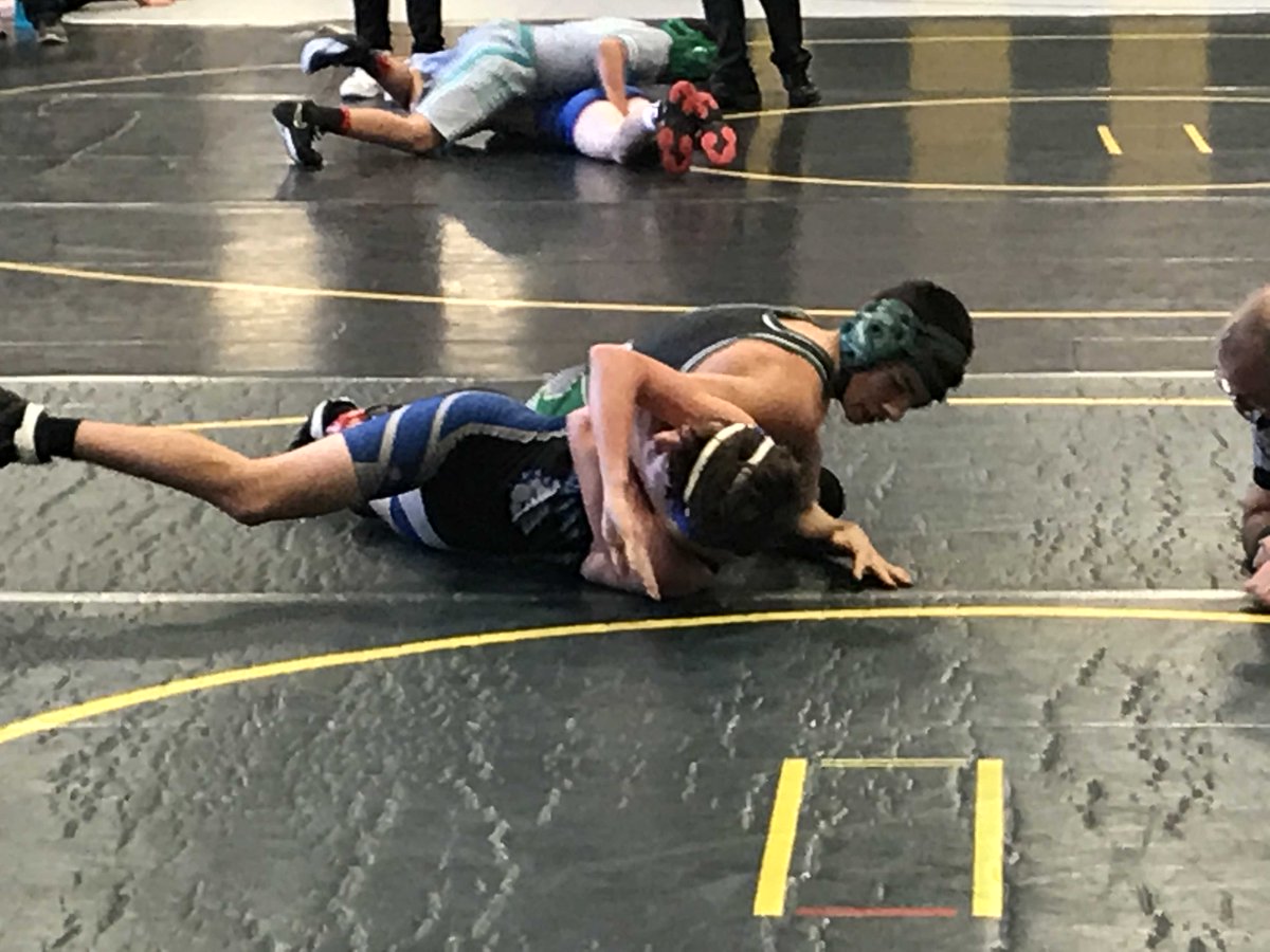 Eighth grader Patrick Hughes works a pinning combination against his opponent.  Congratulations to the Panthers for beating Dublin Grizzel to take 3rd place in the 10 team Panther Duals tournament today!