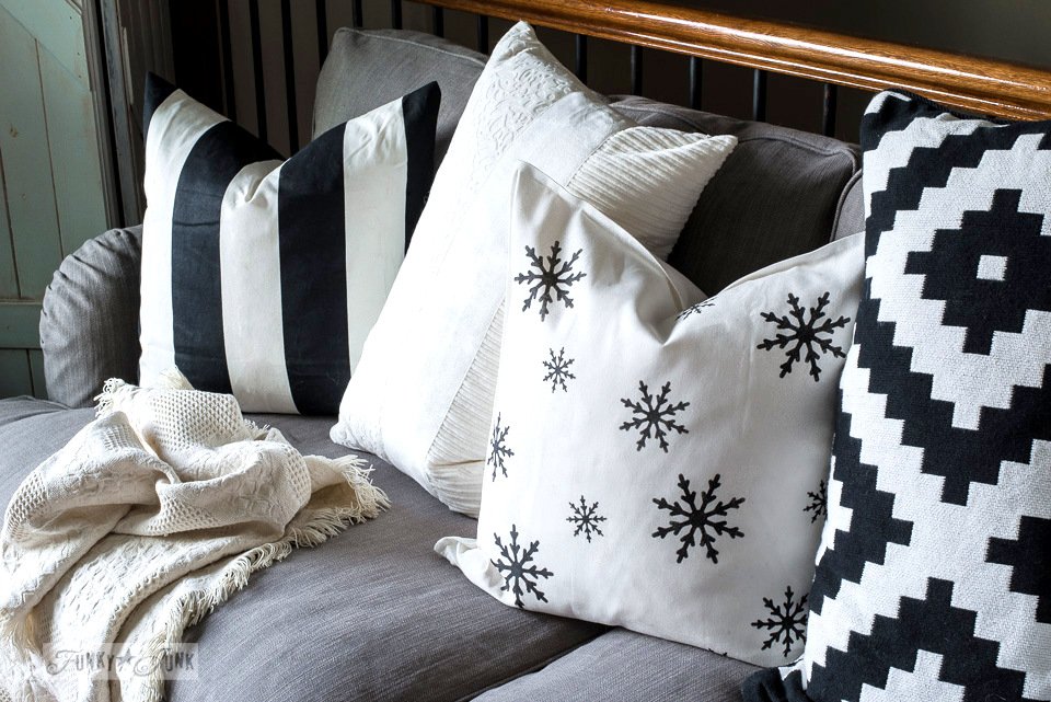 The very best thing about stenciling your own pillow designs? You choose your colours. Here's how snowflakes fit into my own black and white Christmas theme... Learn how at: funkyjunkinteriors.net/2016/12/stenci… #oldsignstencils #funkyjunkinteriors #fusionmineralpaint #pillow #Pillowtalk
