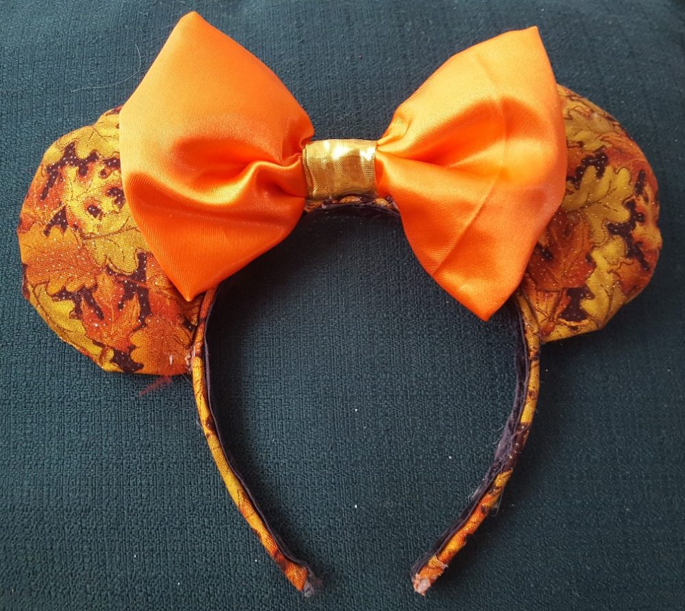 BUY Online From Here: bit.ly/2BOdNB5 Handmade Mickey/Minnie Mouse Ears Headbands by rings42000 Handmade Mickey/Minnie Mouse Ears Headband. Autumn Leaves themed fabic ears with a shiny orange bow. Will fit adults and most children.