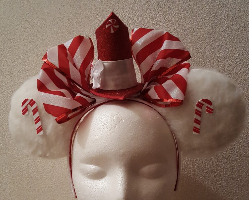 BUY Online From Here: bit.ly/2BO4MrJ Handmade Mickey/Minnie Mouse Ears Headband by rings42000 Handmade Candy Cane Mickey Mouse Ears Headband featuring soft white fur ears with a red glittery top hat and a red and white striped bow. Will fit adults and most children.