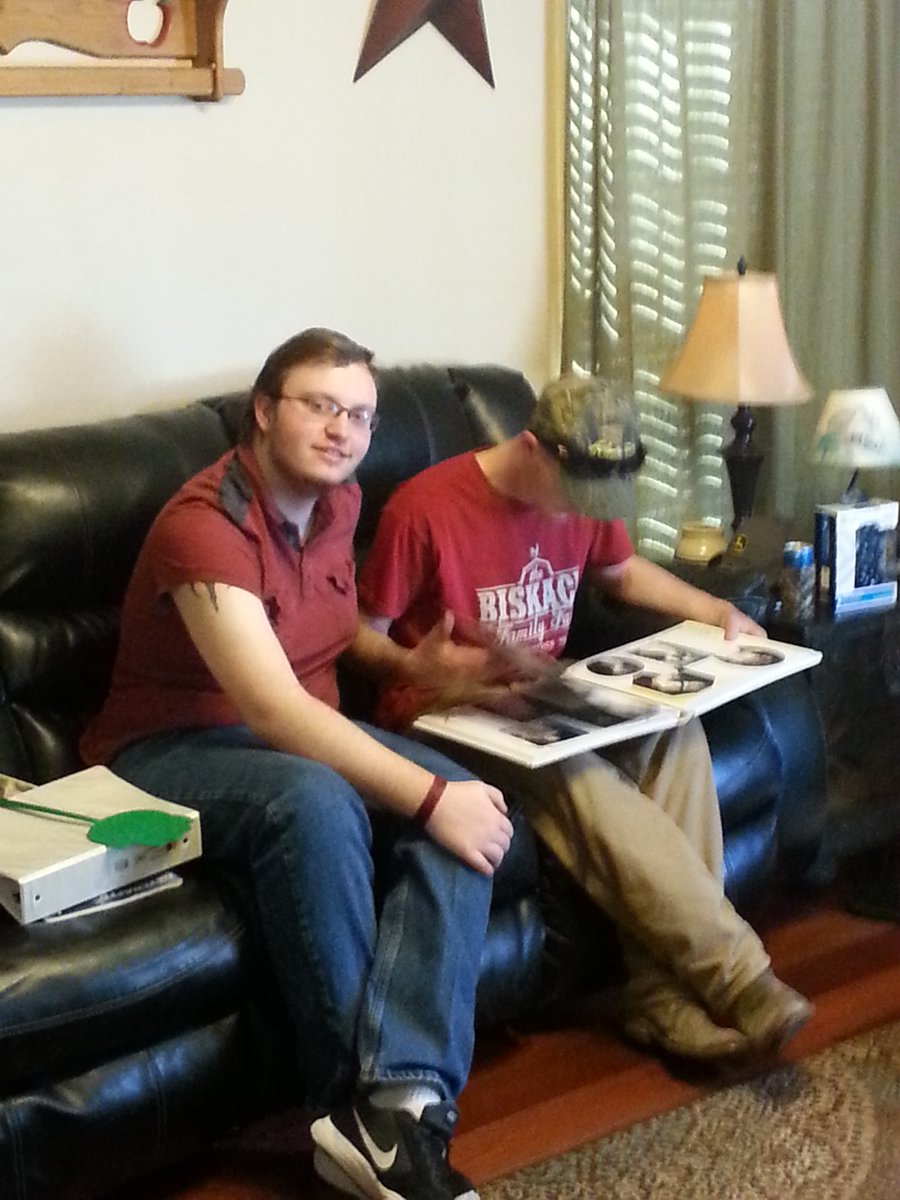 lostcollegemom's tweet photo. Both my boys home looking through old family photos. #traditions #stillclose https://t.co/ELfd6Kq5al