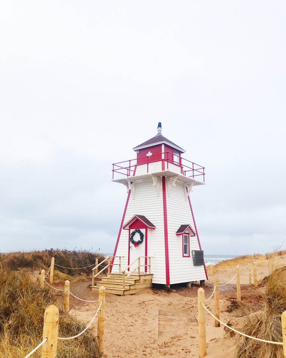 This beauty looking festive!🎄#coveheadlighthouse #explorePEI