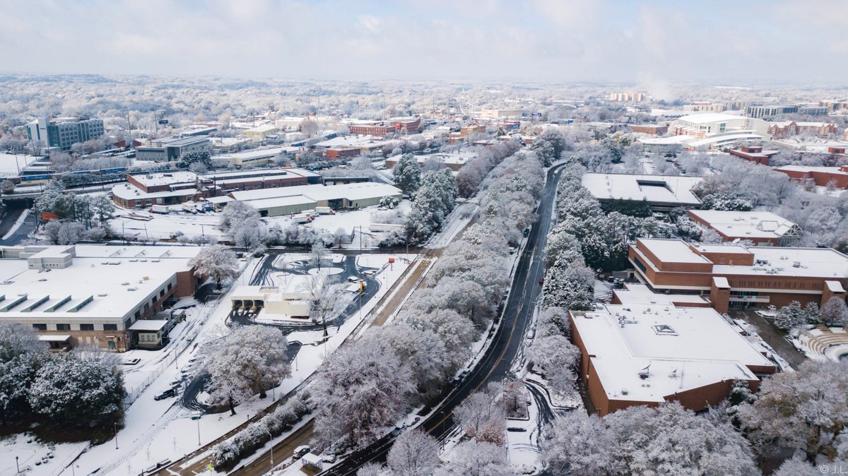GeorgiaTech's tweet photo. Incredible drone shots of campus in the snow taken by civil engineering senior Zonglin Jack Li. 

#gawx #ATLsnow https://t.co/hqFVQ7t6h5