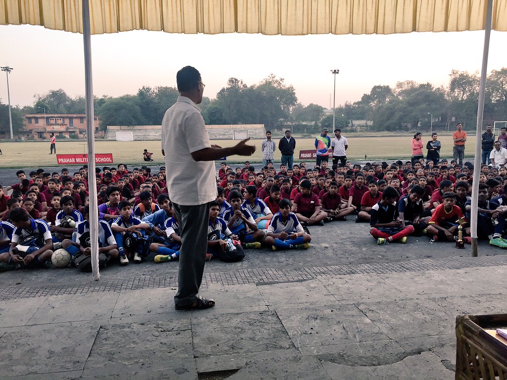 Slumsoccer founder #VijayBarse addresses #Prahar School during the #football finals.