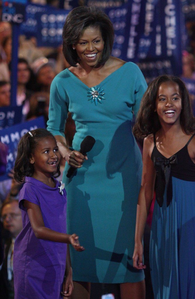 MichelleObamaSt's tweet photo. #Flashback 25 August 2008: Michelle Obama took to the stage on the first day of the Democratic National Convention in Denver wearing a dress by @mariapinto and a brooch by US-British duo #EricksonBeamon. 
#MondayBlues #Fashion #Fashionista #Monday #MichelleObamaStyle #Obama https://t.co/IOtQsTuJtE