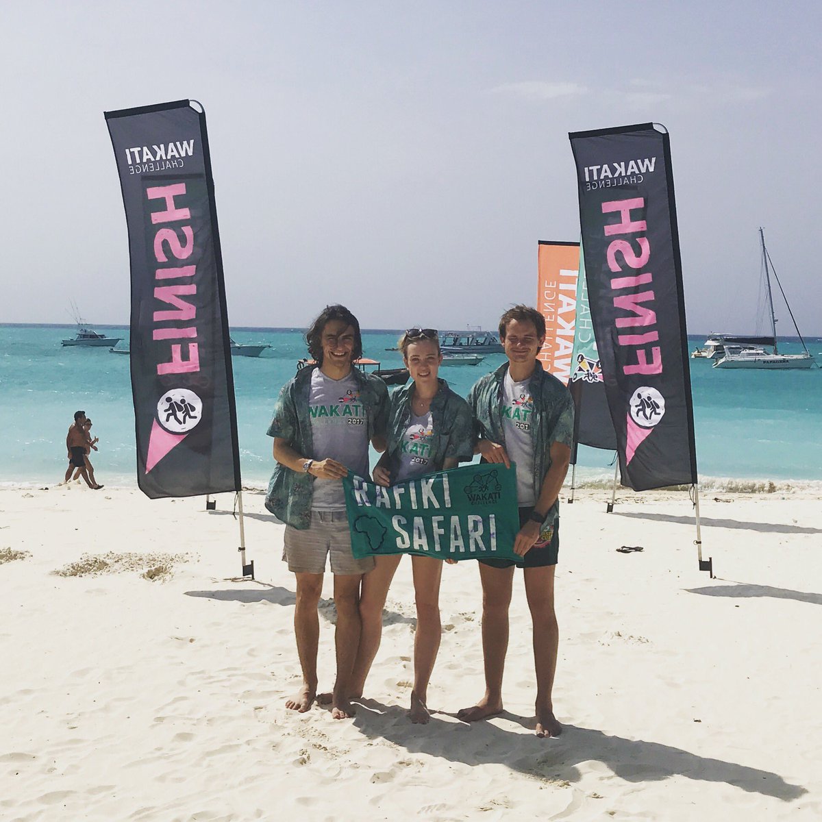 WakatiChallenge's tweet photo. Team 13 - Rifiki Safari cross the Finish Line in Zanzibar in high spirits!  Well done guys!  #adventure #travel #friends #zanzibar #africa #fun #wild https://t.co/SbfQdV4oBk