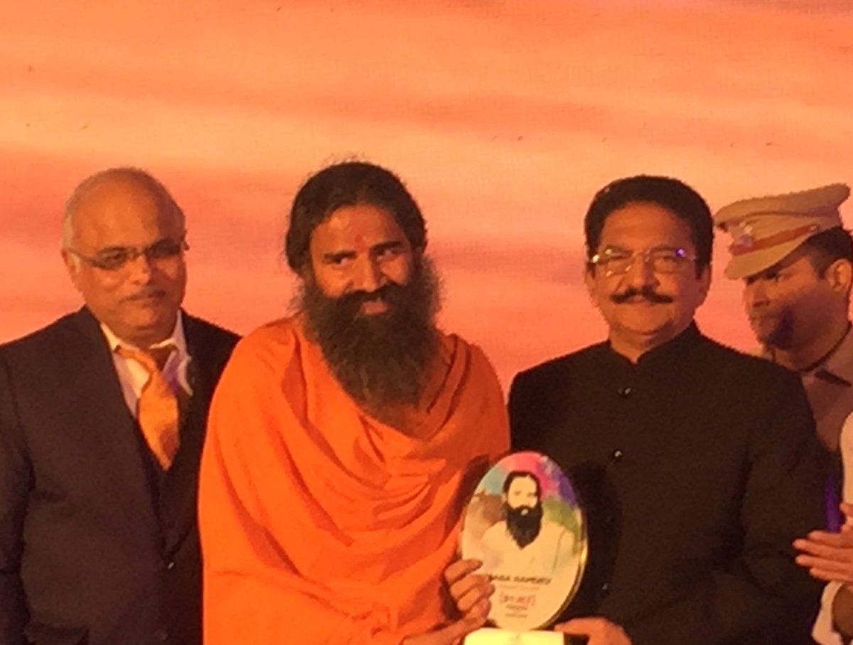 Vinay1011's tweet photo. Delighted to be at the #IPOY2017 Function in Mumbai where Baba Ramdev was declared as Impact Person of the Year -2017 by Maha Guv Ch Vidyasagar Rao!"Baba has shown how Indian knowledge system can rule universal markets!" https://t.co/0blNKPbs8n