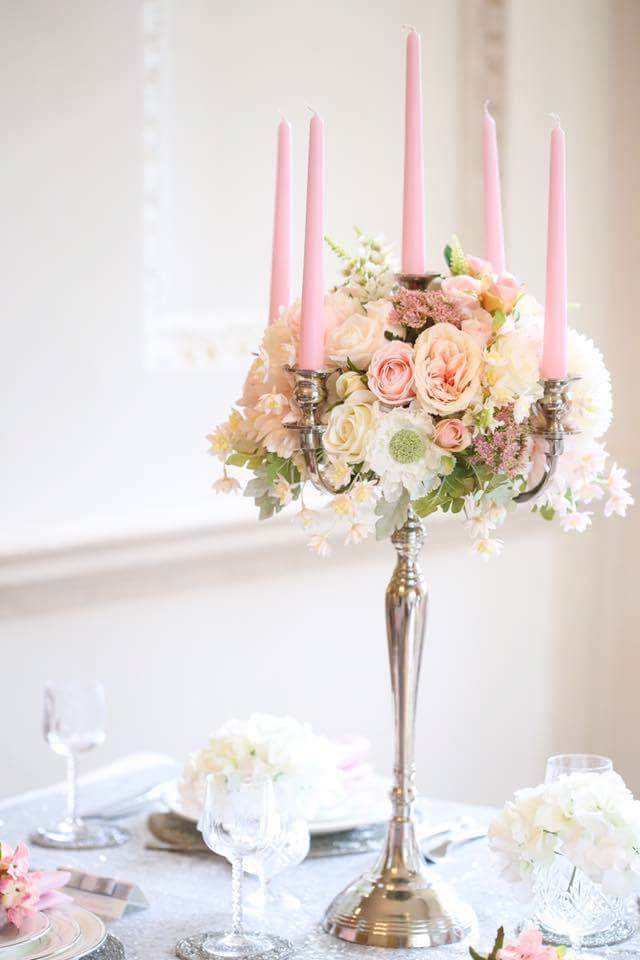 How gorgeous do our silver candelabras look with and artifical flower display .if you would like these for your table decor, mail us on info@newburyweddingservices.co.uk #wedding #Newbury #bridetobe #groomtobe  #TableDecor  #centrepiece #Pink  photo by @annabelfarleyphotography