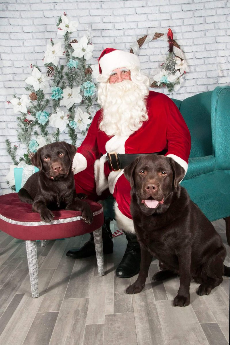 When the baby won't sit with Santa unless momma is in the photo too :)