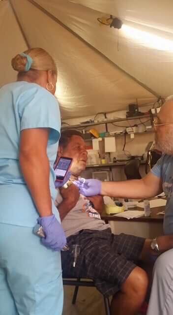 AWDisaster's tweet photo. Pics of todays missions. Supply pick up at the airport & food, water, & toy distribution on #Vieques. Also pictured: a man receives treatment at the “hospital” which is still operating out of tents.
#AmericanWayDisasterRelief
#CloseTheGaps
#PrSeLevanta
#PuertoRico https://t.co/daUpGrCW1j