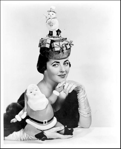 ValeriAgostini's tweet photo. Merry Christmas! Wishing you all a wonderful day full of glamorous gifts and  festive cheer. Image from 1952 of Elaine Johannsen wearing a millinery masterwork created by Mr John of New York https://t.co/sWxtMr0APD