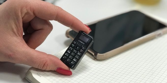XYNAPX's tweet photo. The Zanco tiny t1 is (probably) the world’s smallest functional phone. At less than 2 inches long, it’ll fit just about anywhere, and you’ll be able to use it to make calls and send texts, too. 

#Xynapx
#TinyPhone
#ZancoTinyT1

Source: https://t.co/MBQzCncvID https://t.co/mW45zrt1xn
