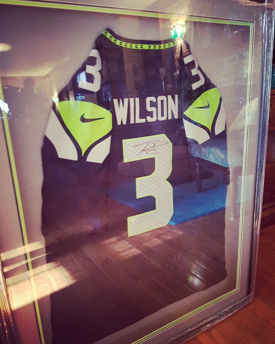 <a href="/DangeRussWilson/">Russell Wilson</a> thank you signed my sister <a href="/KristaSim/">The Real KMFS</a> #Seahawks #12thMan #hawkmas