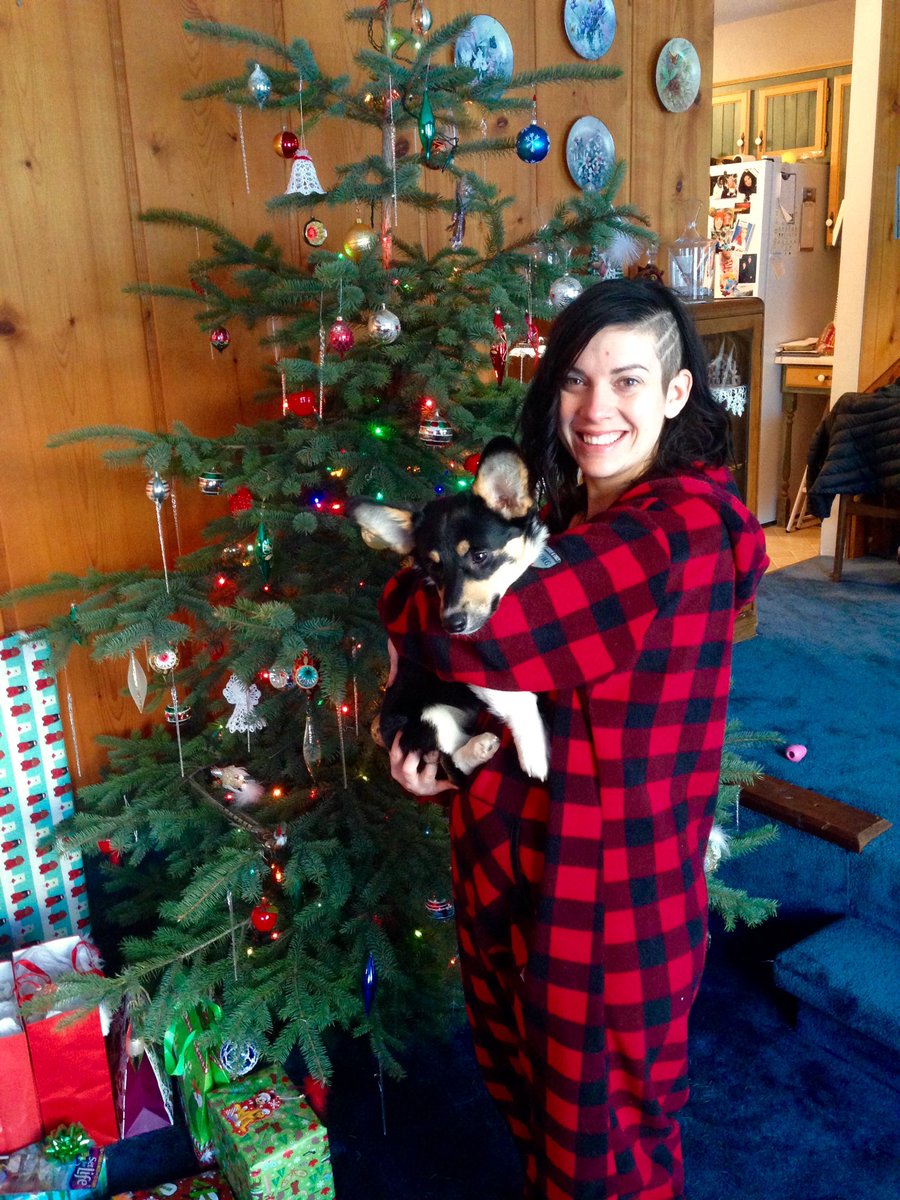 AmieLeonard's tweet photo. Merry Christmas from Pancake the corgi and I. #MerryChristmas2017 #snugasabug #onsies #snugglesohard https://t.co/83hYW1fcok