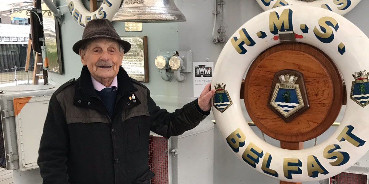 SSAFA's tweet photo. On the second day of #Christmas we're recognising the fantastic work of our volunteers. Many  go above and beyond for our beneficiaries, including caseworker Karen who fulfilled Royal Navy veteran George's wish to revisit the ship he served on! https://t.co/pk3SmnXgc1