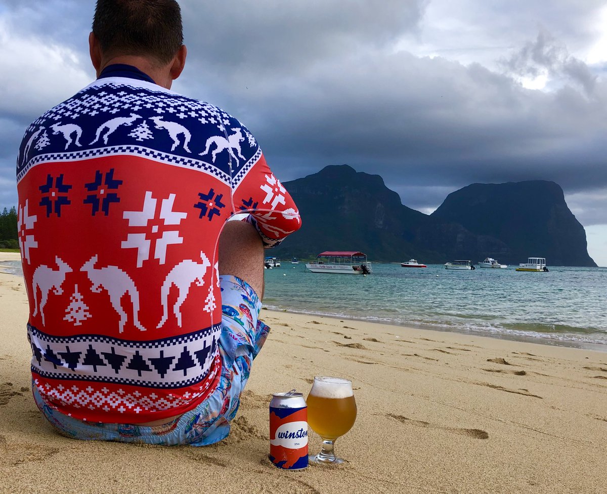 When you coordinate your ugly Christmas rashie with your beer. Enjoying an early evening <a href="/ShenanigansBrew/">Shenanigans Brewing</a> Winston on the beach #shenanigans #LordHoweIsland