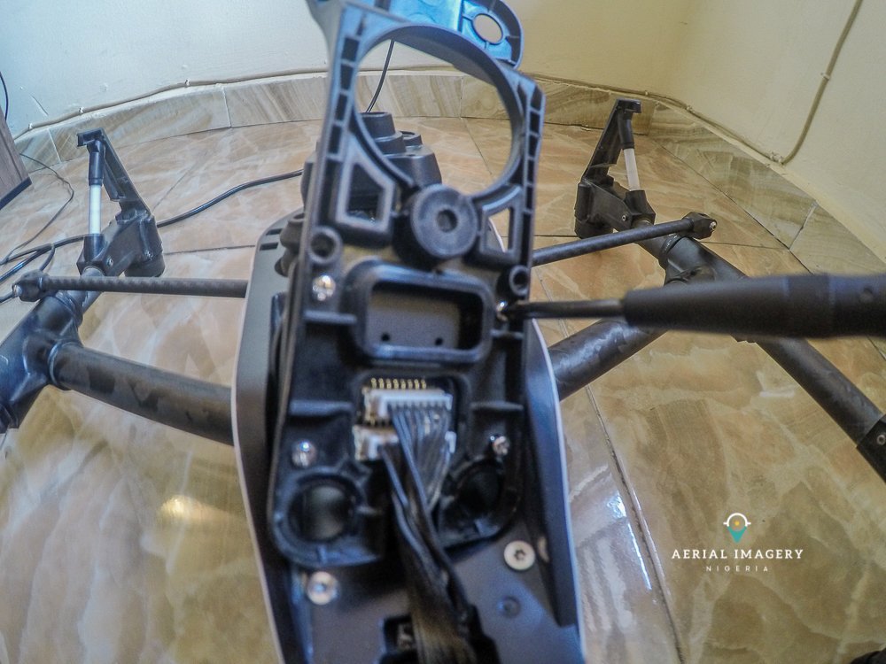aerialimageryNG's tweet photo. Inspire 1 came in with no live feed due to a broken gimbal mount . After years of use wear and tear got the best of it.We replaced with gimbal mount&mounting plate with an original OEm part from DJI to restore feed. Customer left happy. #dronerepair #dronerepairnigeria #dronefix https://t.co/64letbRGxL