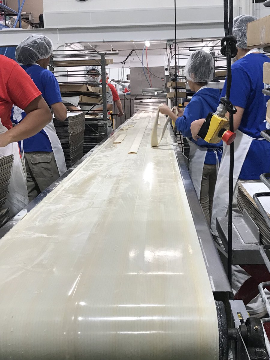PeteNZ_2011's tweet photo. O&amp;H Bakery adds 30-40 seasonal workers to keep up w/ demand around the holidays. This = part of the Kringle assembly line. @tmj4 https://t.co/zDiRu3K608