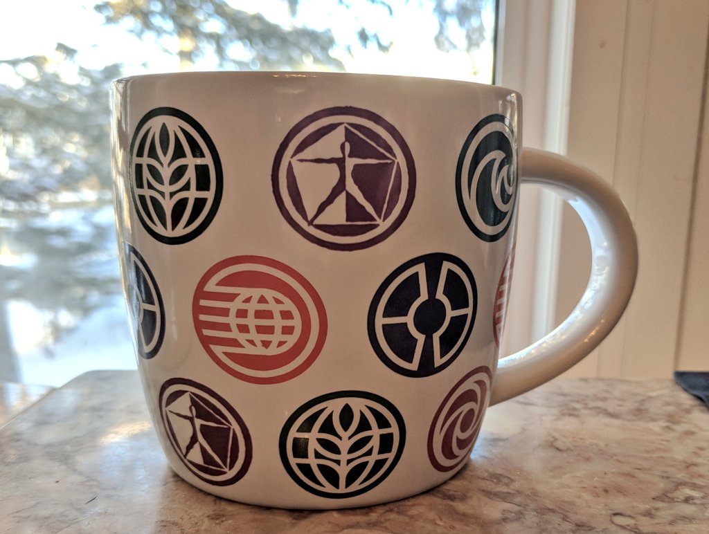 snicholson's tweet photo. My one souvenir from Disney is an mug celebrating Epcot's 35th covered with symbols meaningful to me and others who recall a better park.  #horizons #dreamfinder #hydrolator #bitteroldman #getoffmylawn https://t.co/XUbktLcWIG