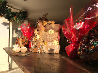 HambletonBakery's tweet photo. The #TalentedTania has been working her magic on the #Christmas displays in our shops. #TalentedTania #behindthescenes #windowdisplay https://t.co/qLQPwDf6Dl