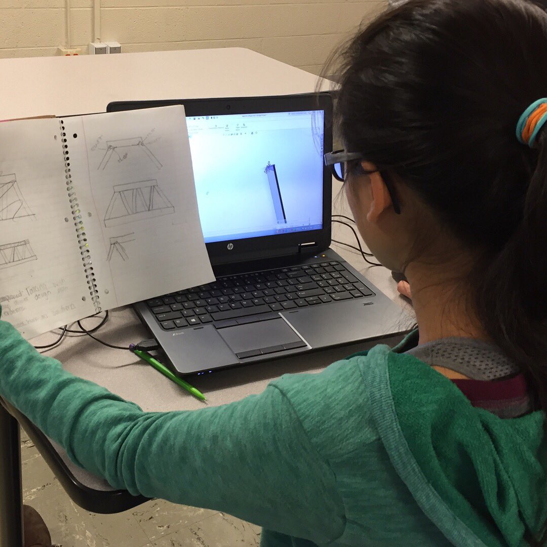 JAengineers's tweet photo. 8th graders working on balsa wood bridges! Hands on manufacturing, applying trigonometry, documenting with design notebooks, harnessing industry-used SolidWorks to create 3-D models! Fun stuff! https://t.co/imU8tCGlK1